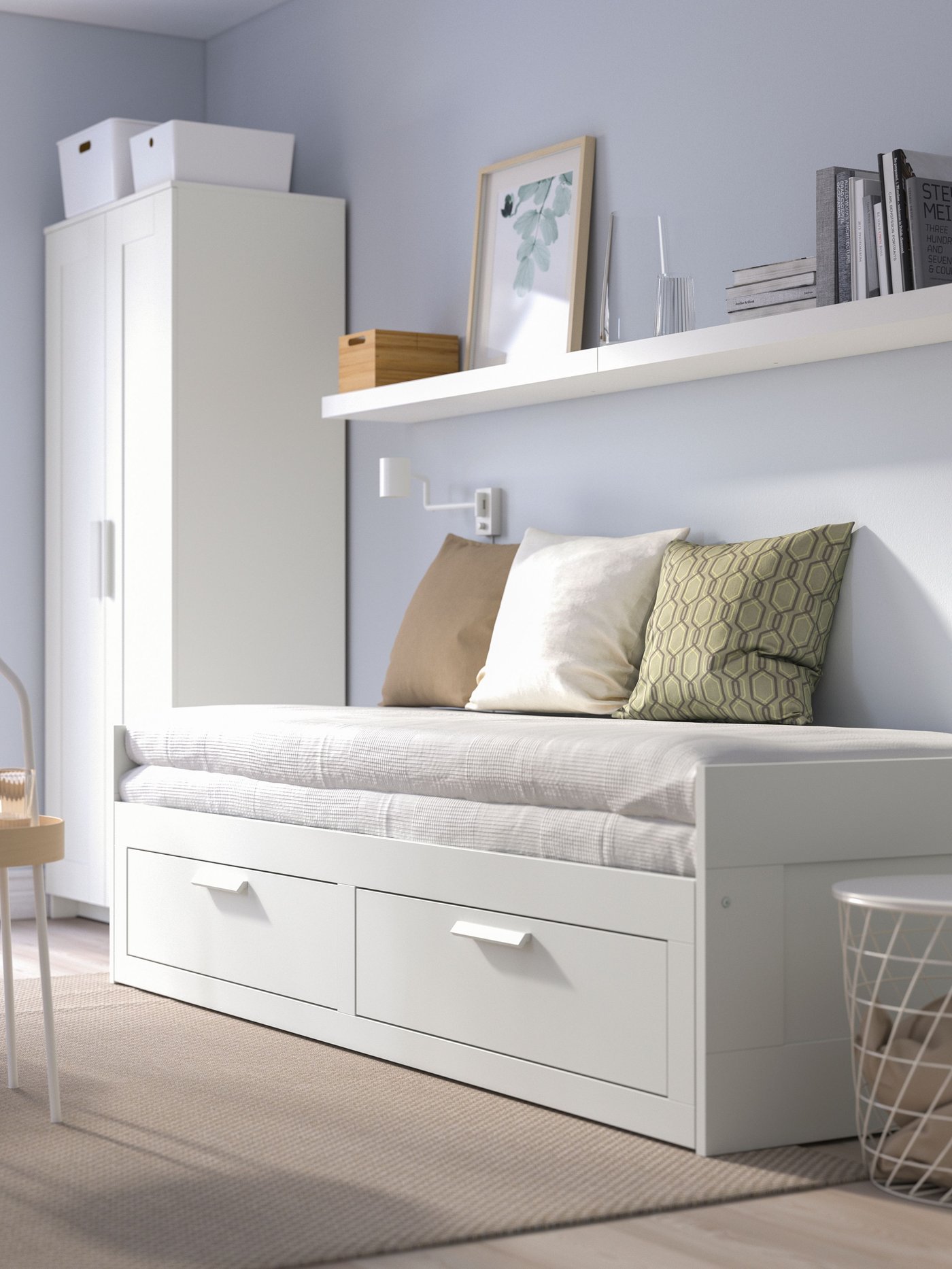 A white BRIMNES day-bed frame with 2 drawers