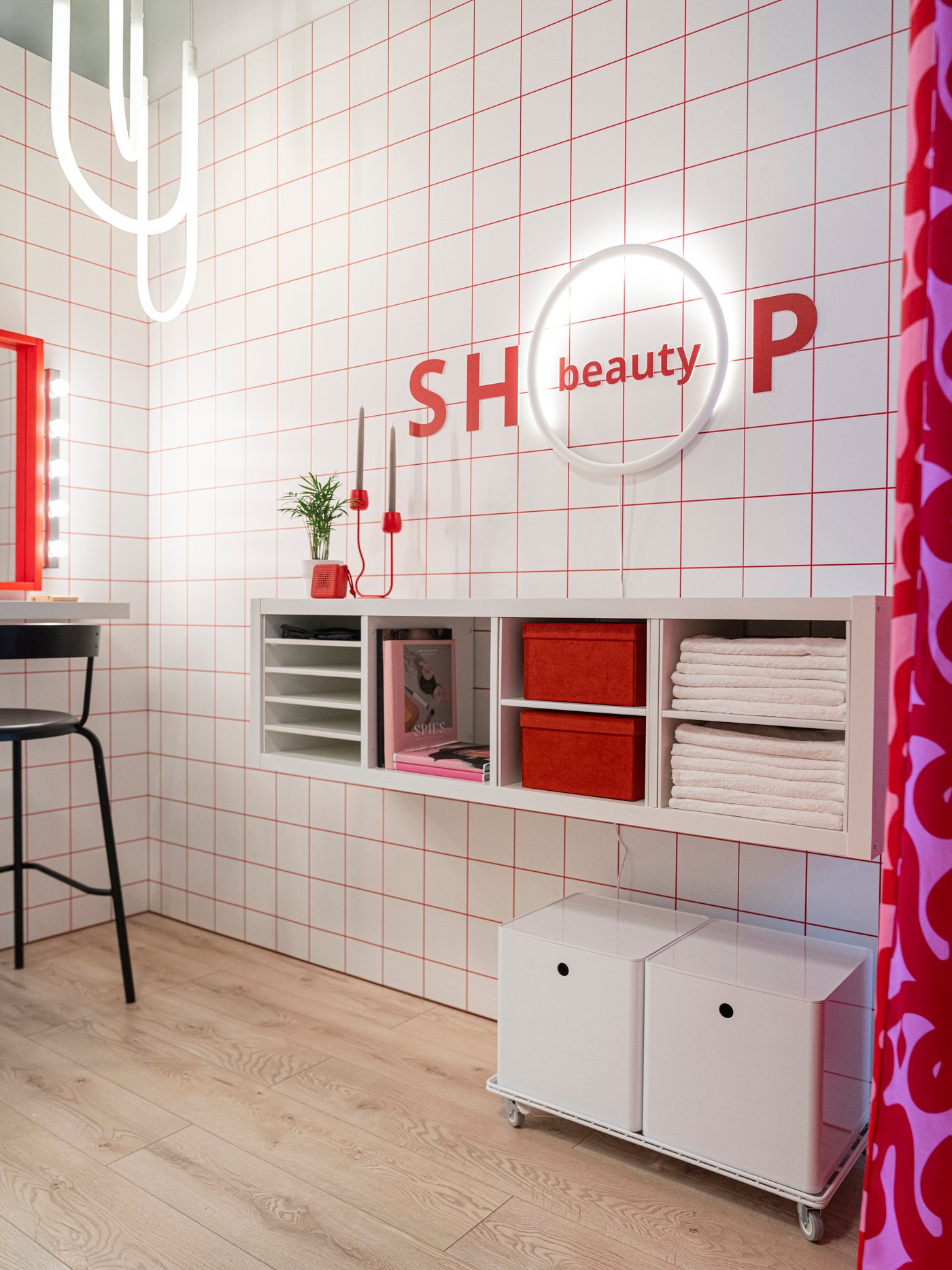 A white KUGGIS storage box with lid