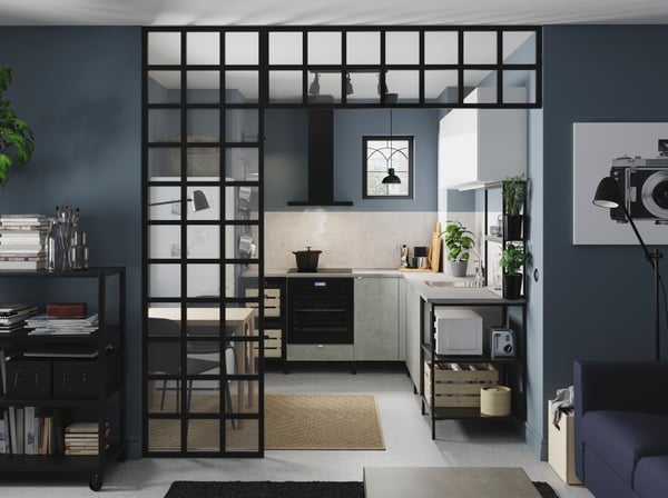 A black MATÄLSKARE wall mounted extractor hood in the kitchen