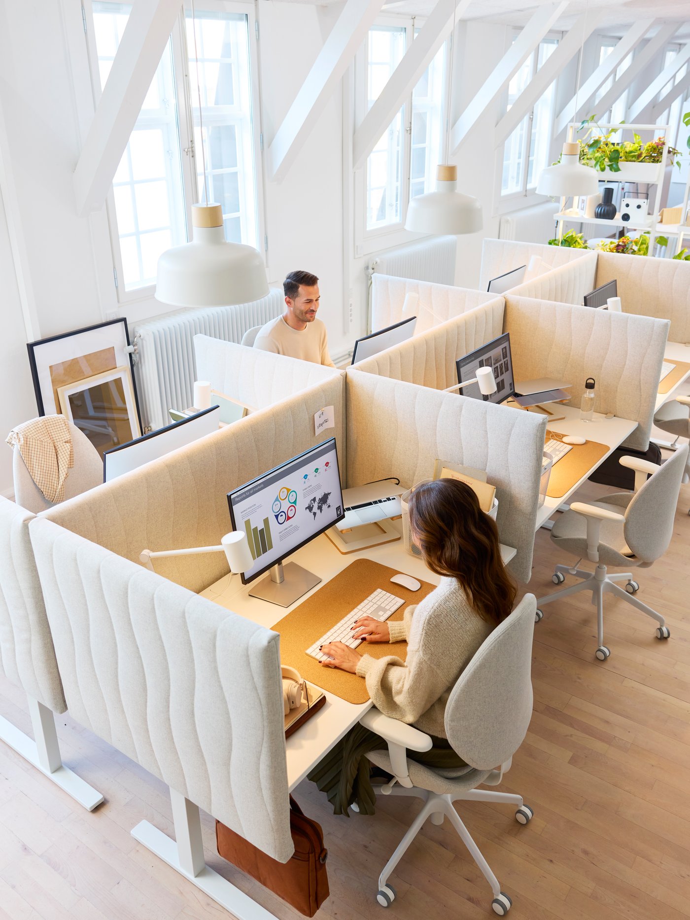 A Gunnared beige MITTZON acoustic screen for desk in the home office