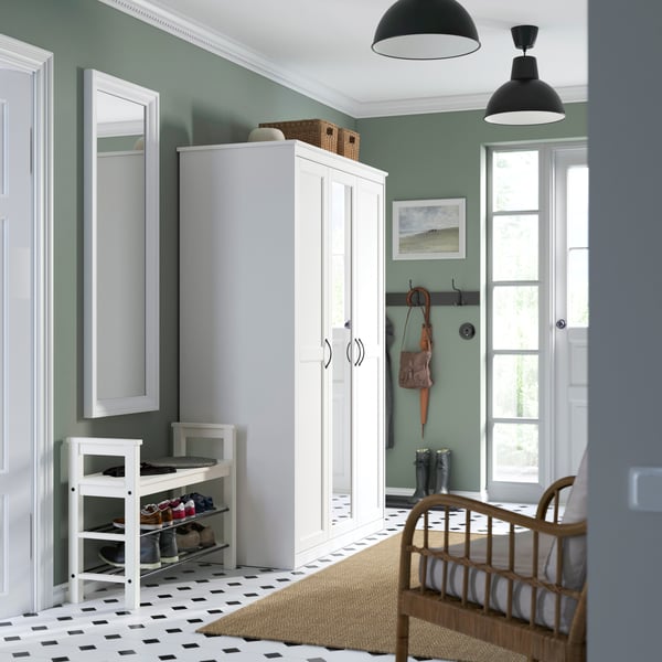 A white SONGESAND wardrobe