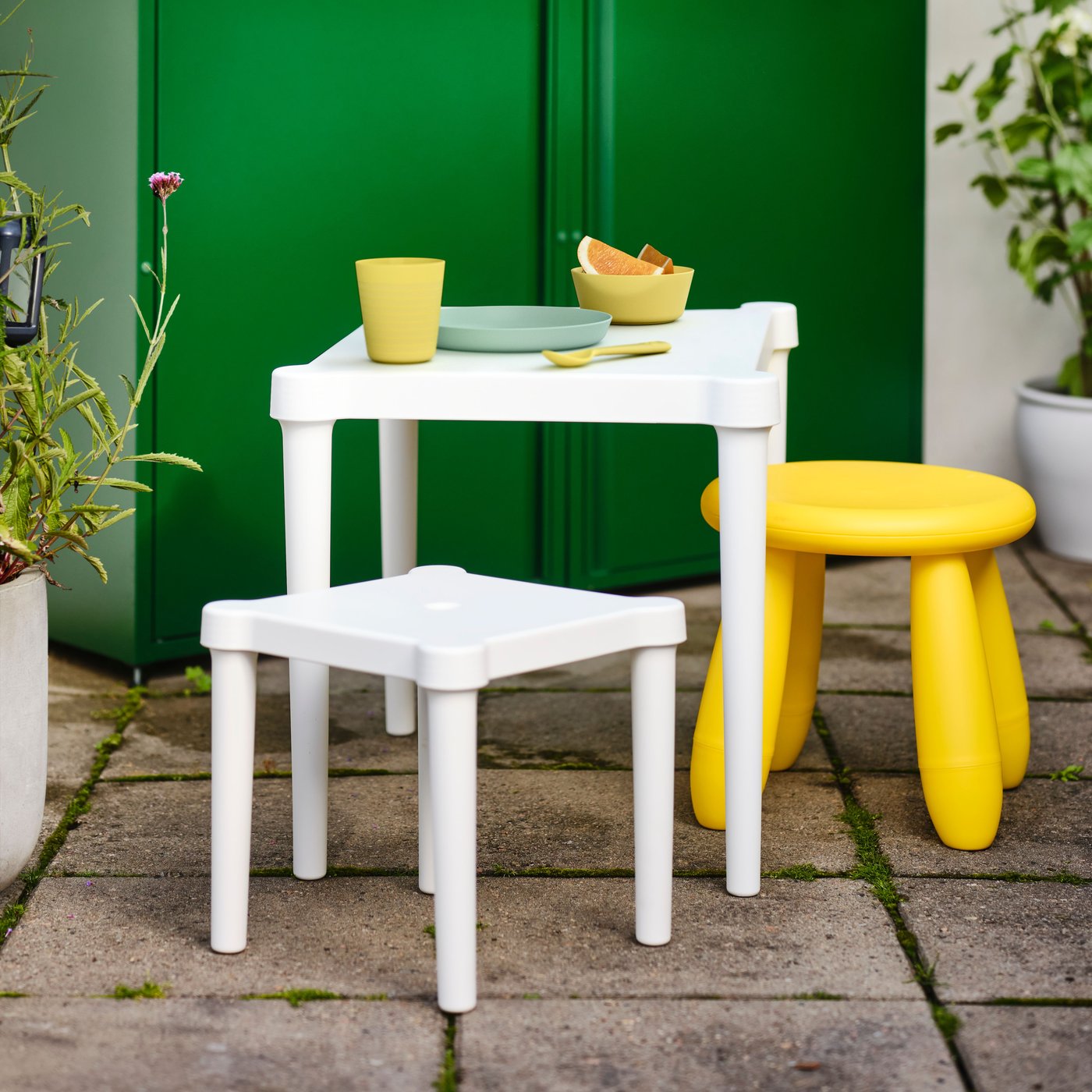 An in/outdoor/yellow MAMMUT children's stool