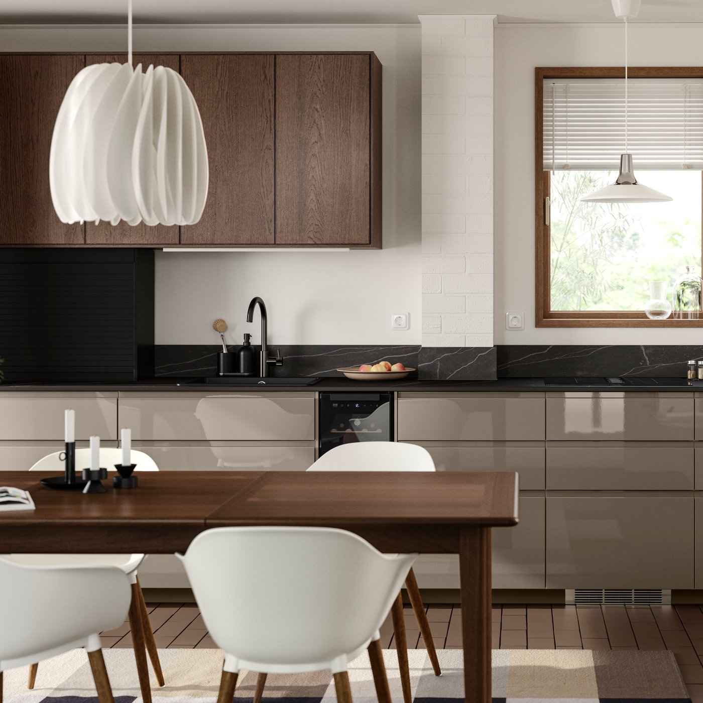 A white kitchen has base cabinets with high-gloss dark grey-brown VOXTORP fronts and wall cabinets with brown SINARP fronts.