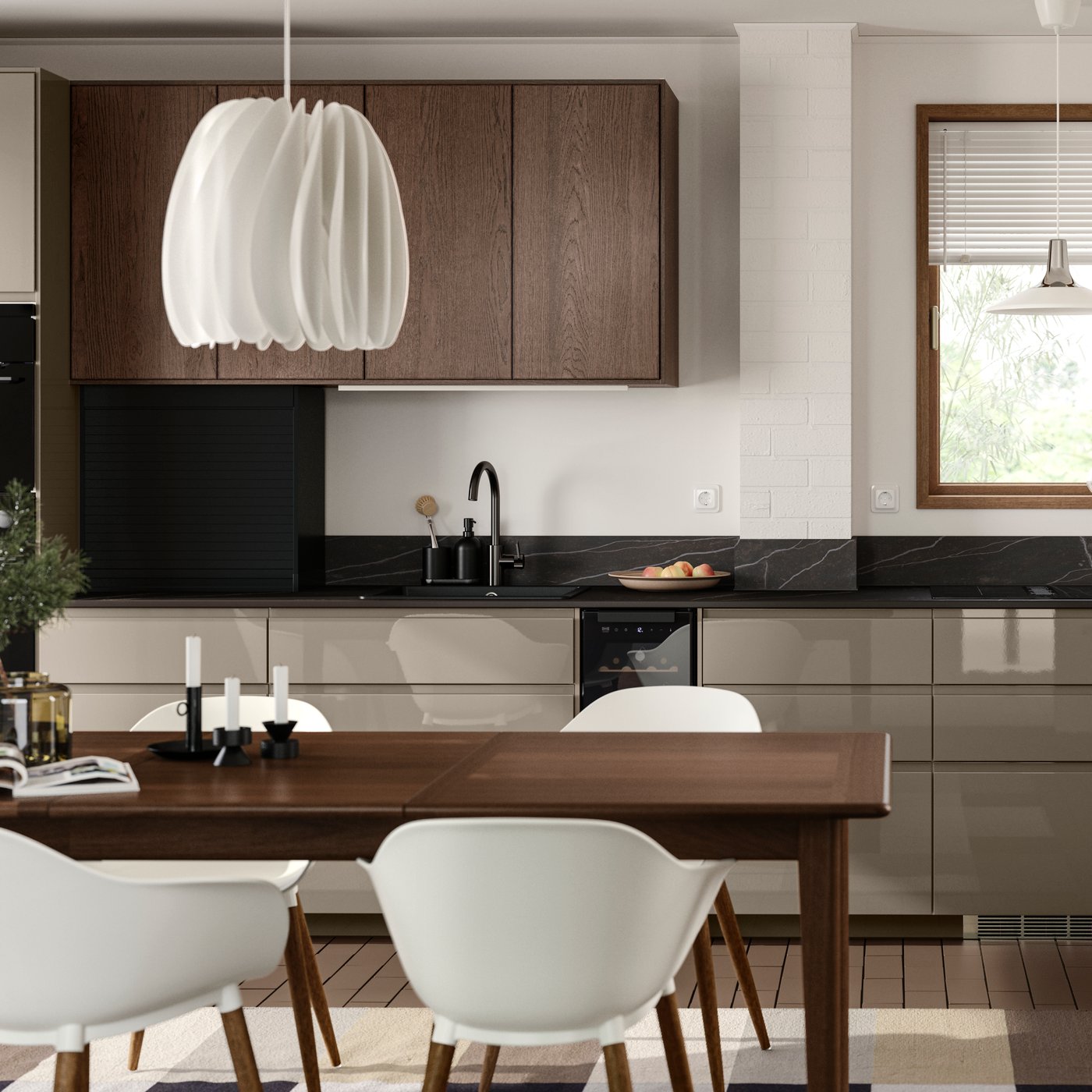 A white kitchen has base cabinets with high-gloss dark grey-brown VOXTORP fronts and wall cabinets with brown SINARP fronts.