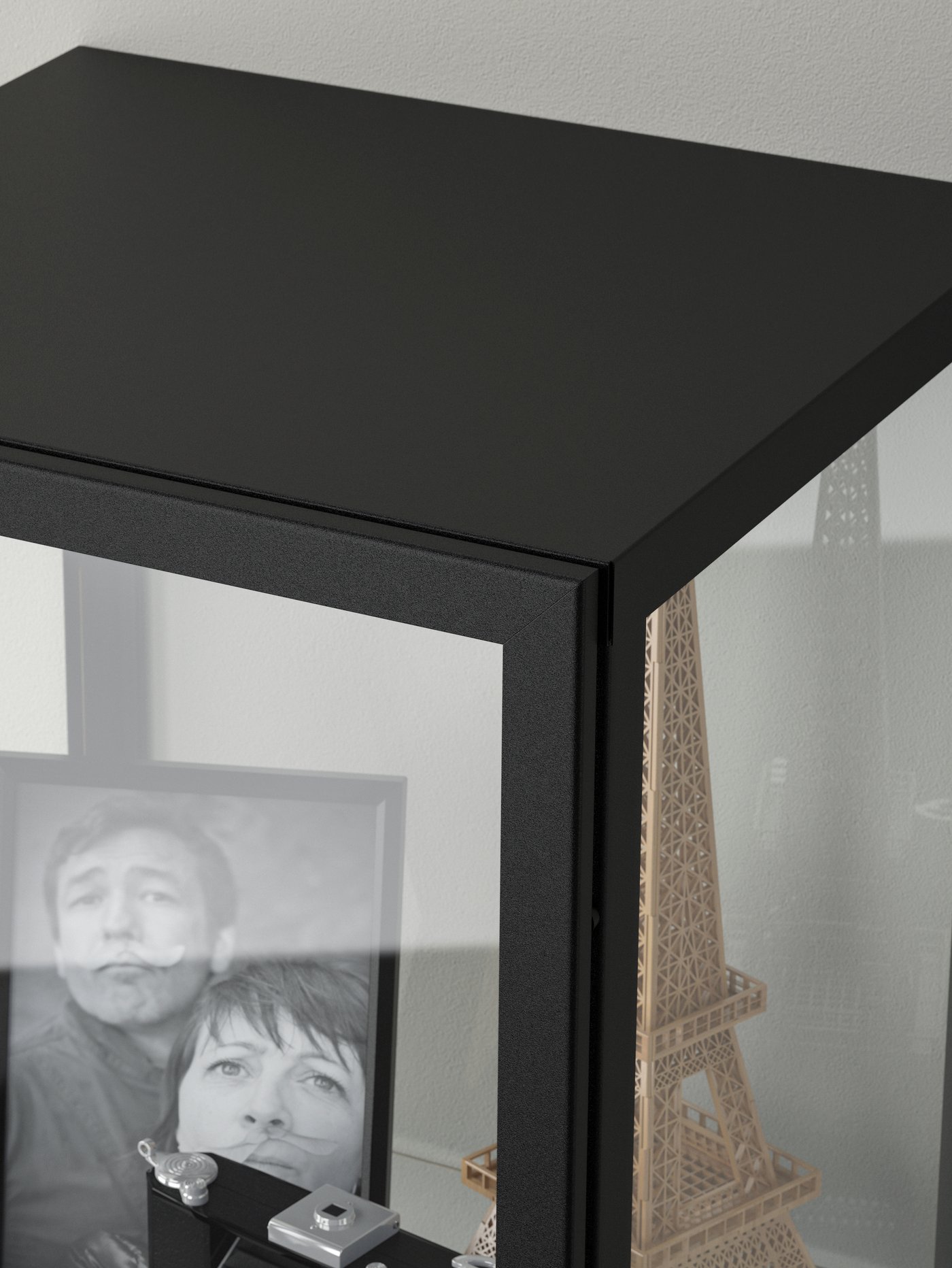 A black BLÅLIDEN glass-door cabinet