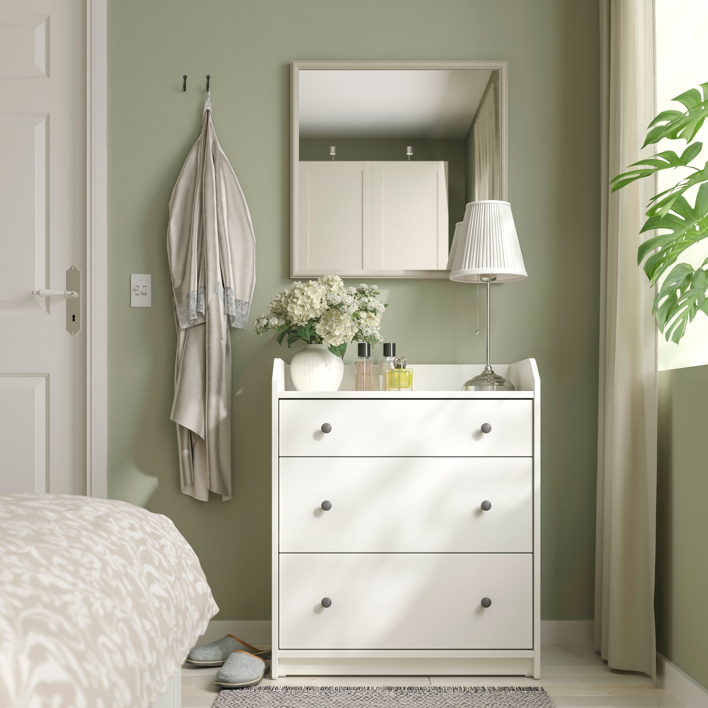 A grey-beige NYPONBUSKE mirror