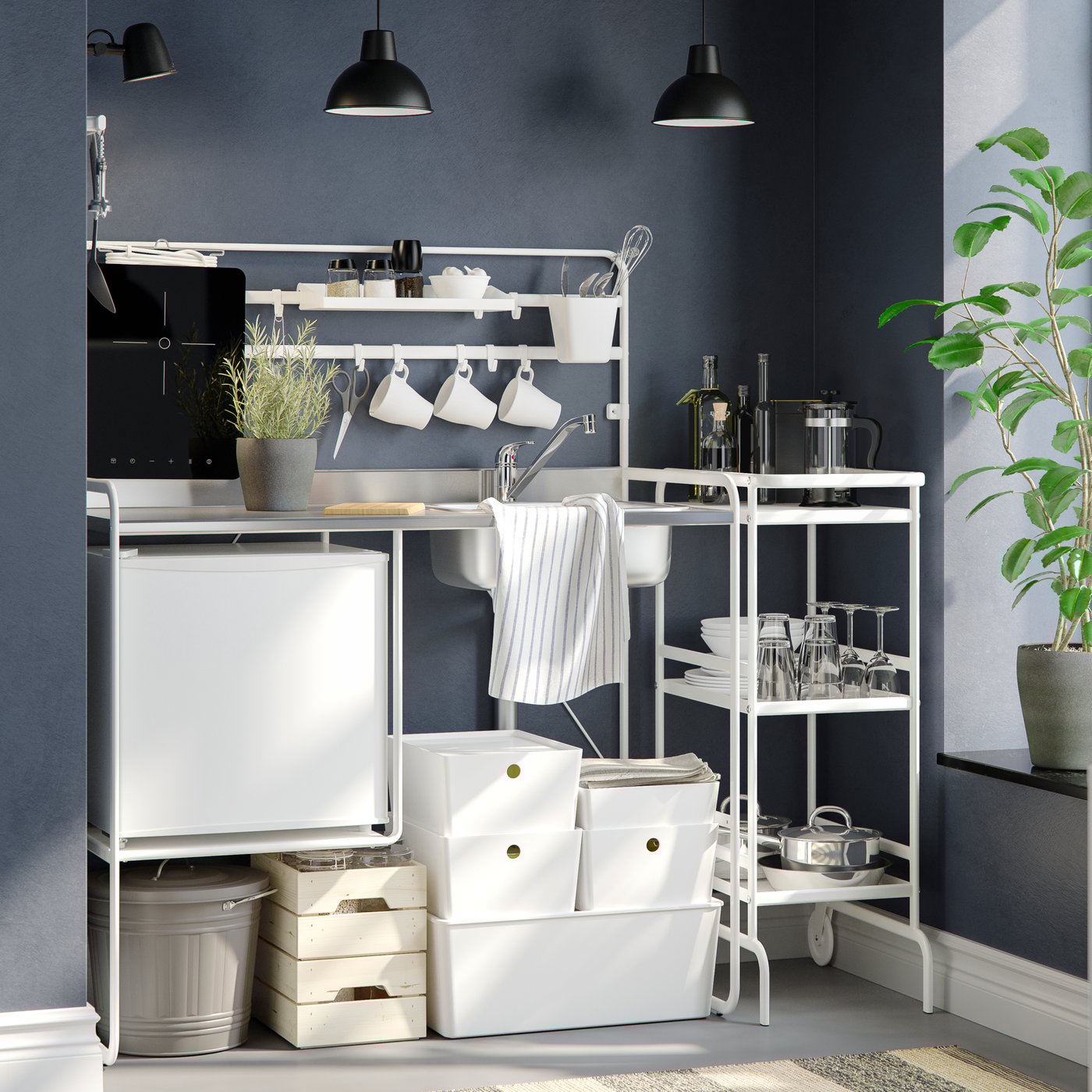 A white TILLREDA portable induction hob in the kitchen