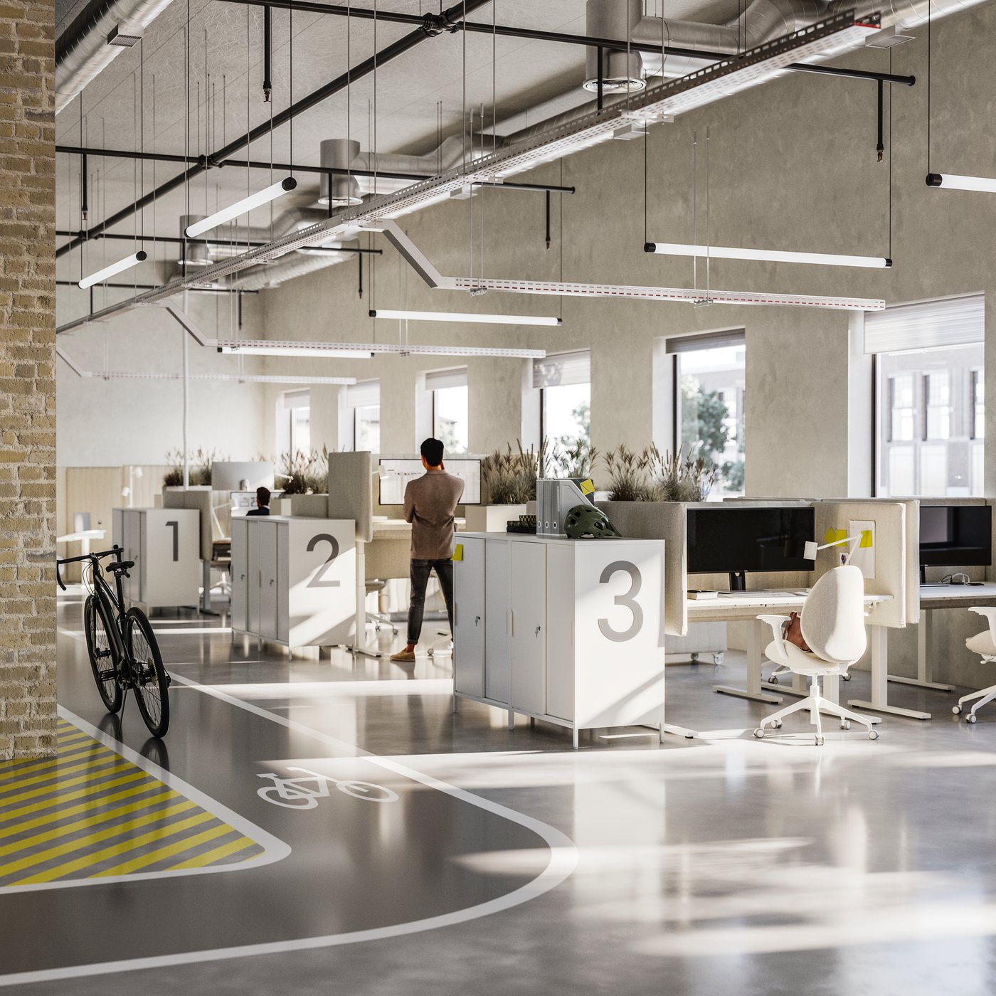 Three rows of desks in an airy, open-plan office. Each workstation features acoustic screens and ergonomic seating.