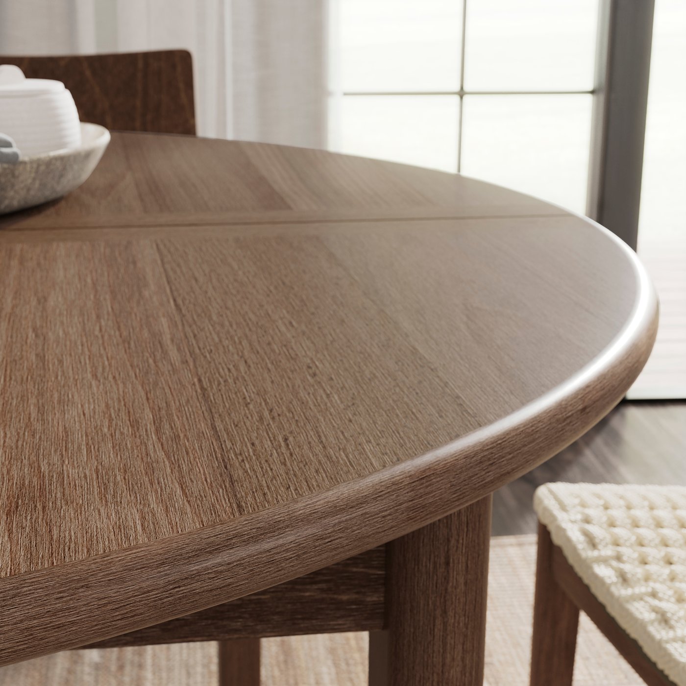 A brown beech/veneer SKANSNÄS extendable table.