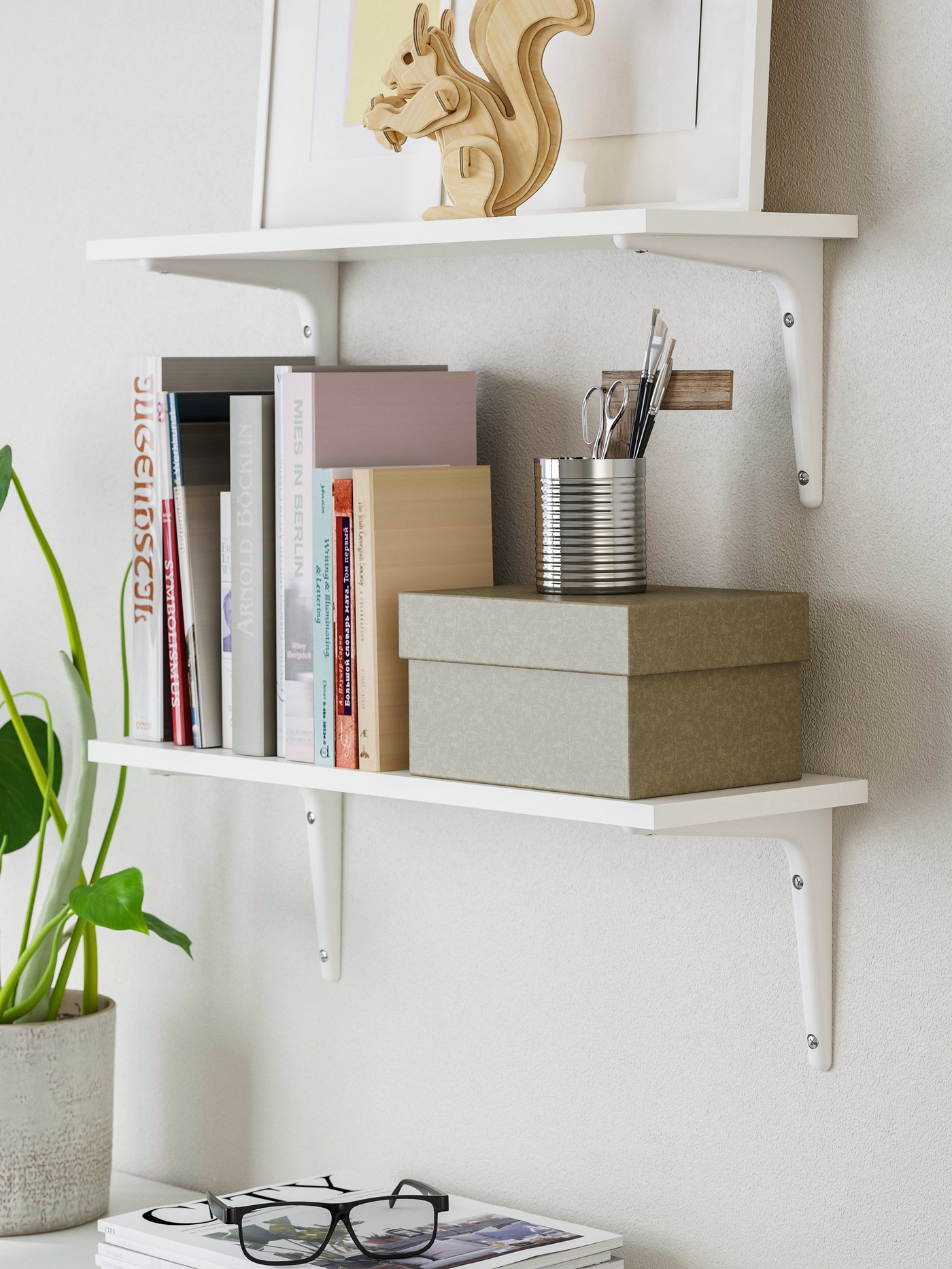 A white/white SIBBHULT wall shelf combination
