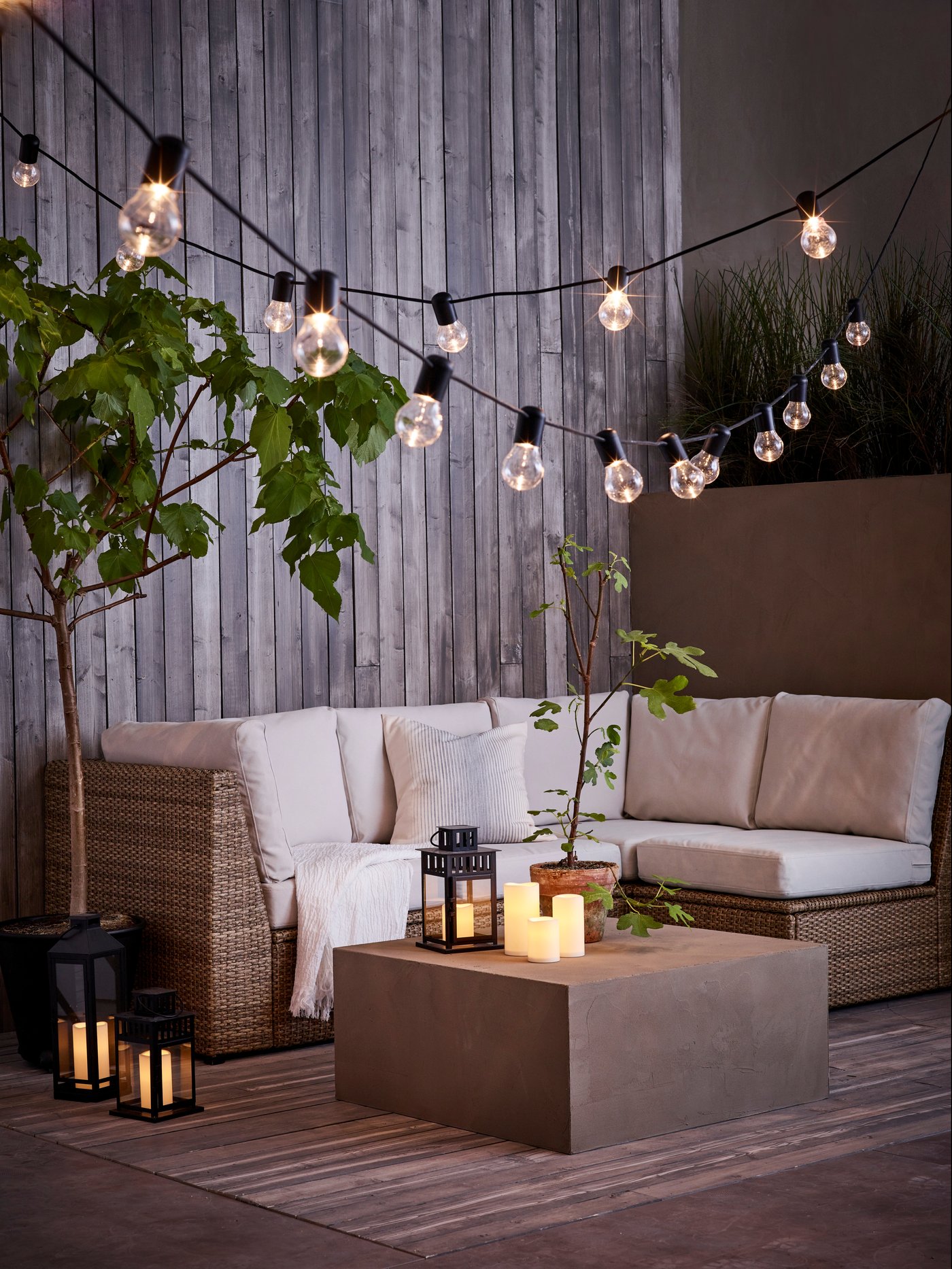 An in/outdoor black BORRBY lantern for block candle outside