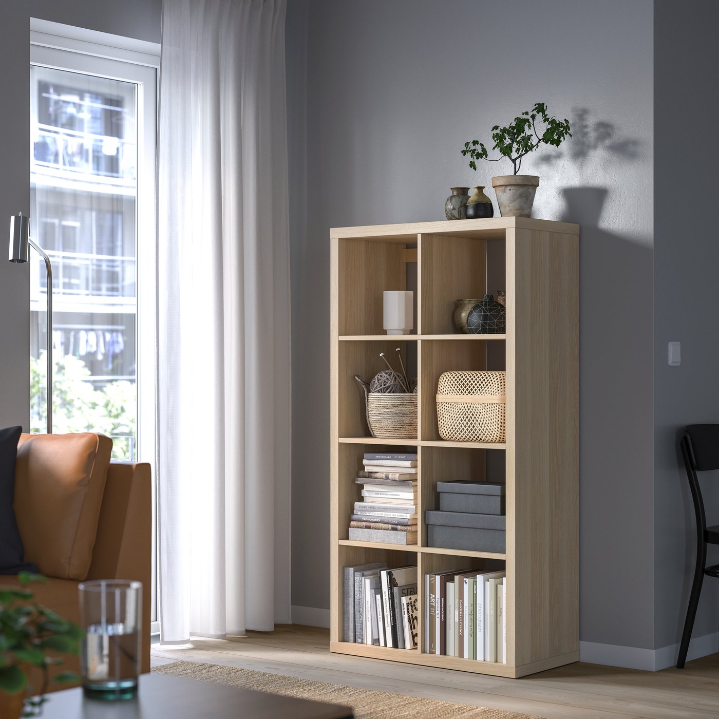 A white stained oak effect KALLAX shelving unit