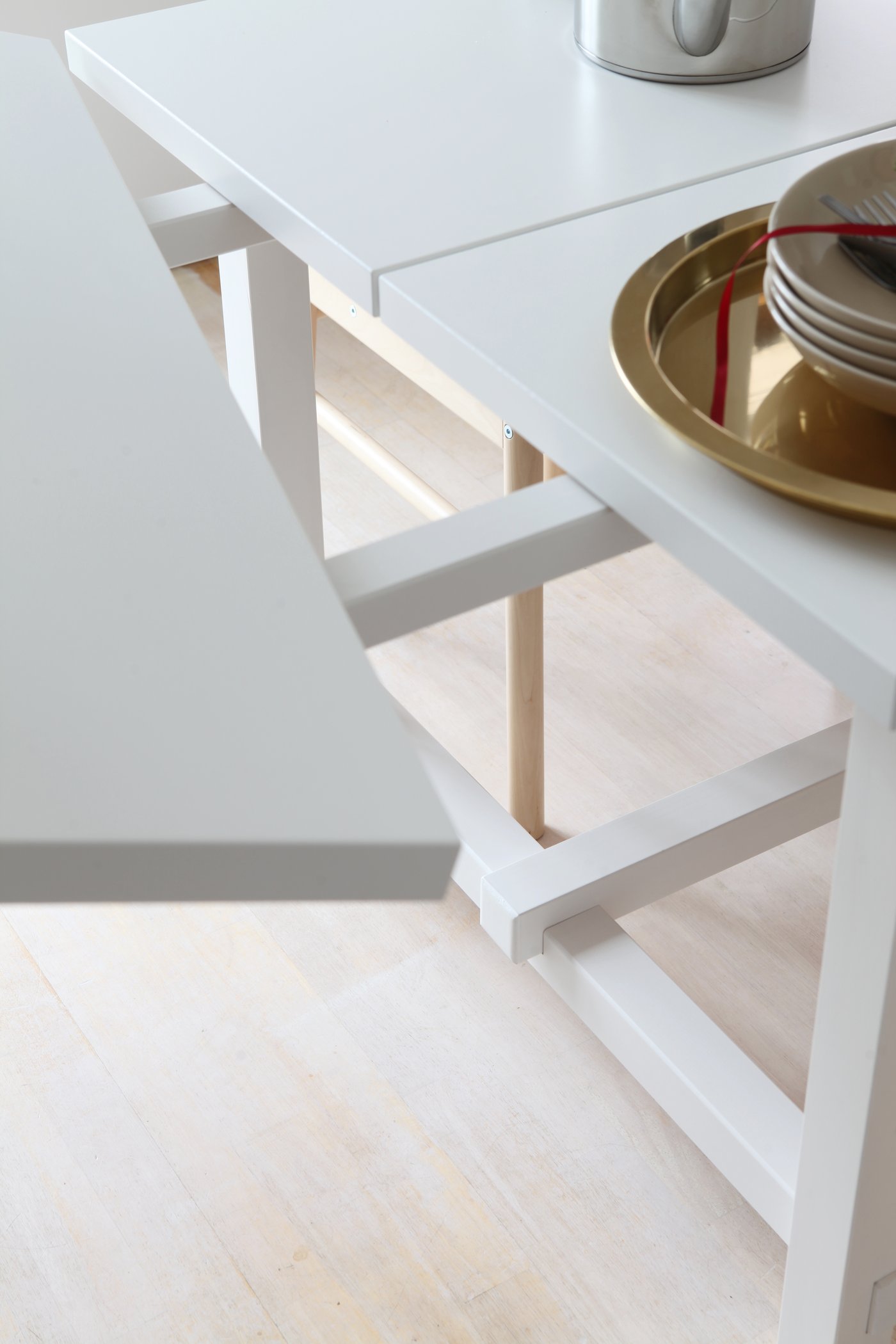 A white NORDVIKEN extendable table