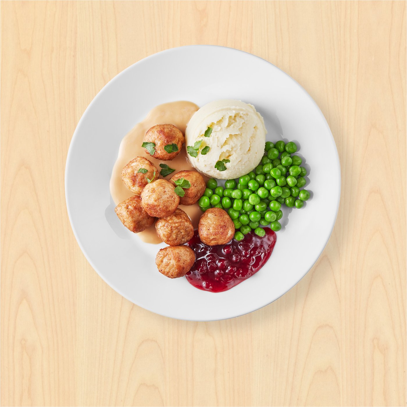 Masove kuličky IKEA na talíři.