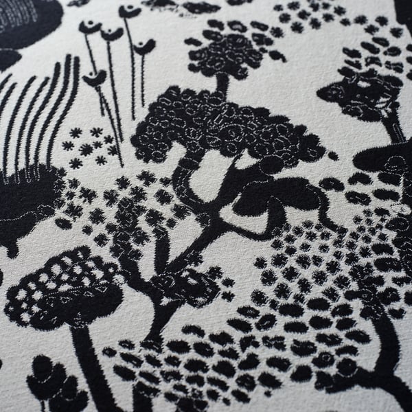 A black/white STOCKHOLM 2025 pouffe