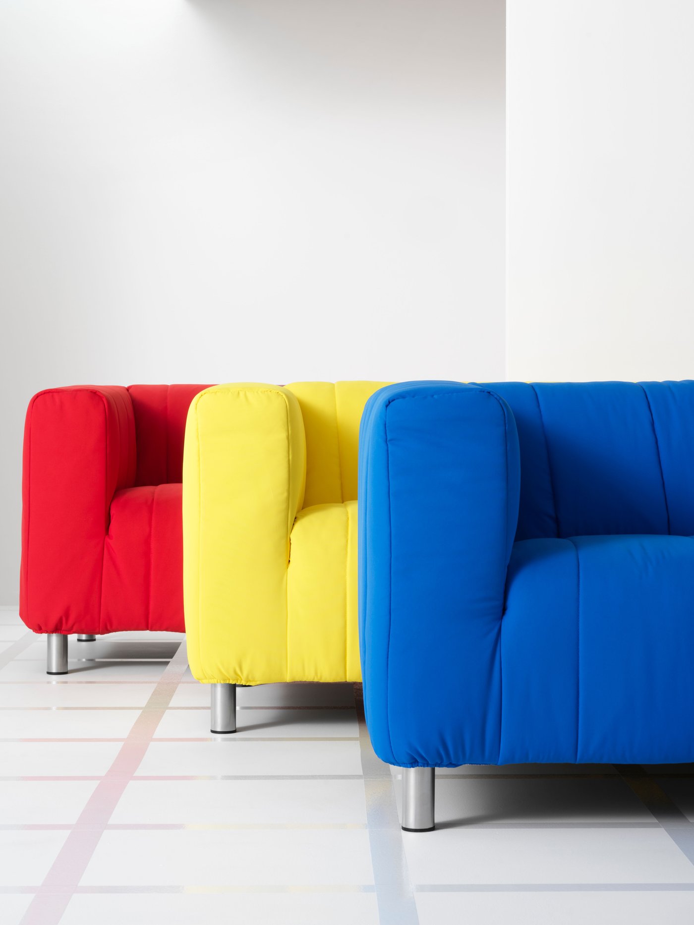 A Långban bright blue KLIPPAN cover for 2-seat sofa