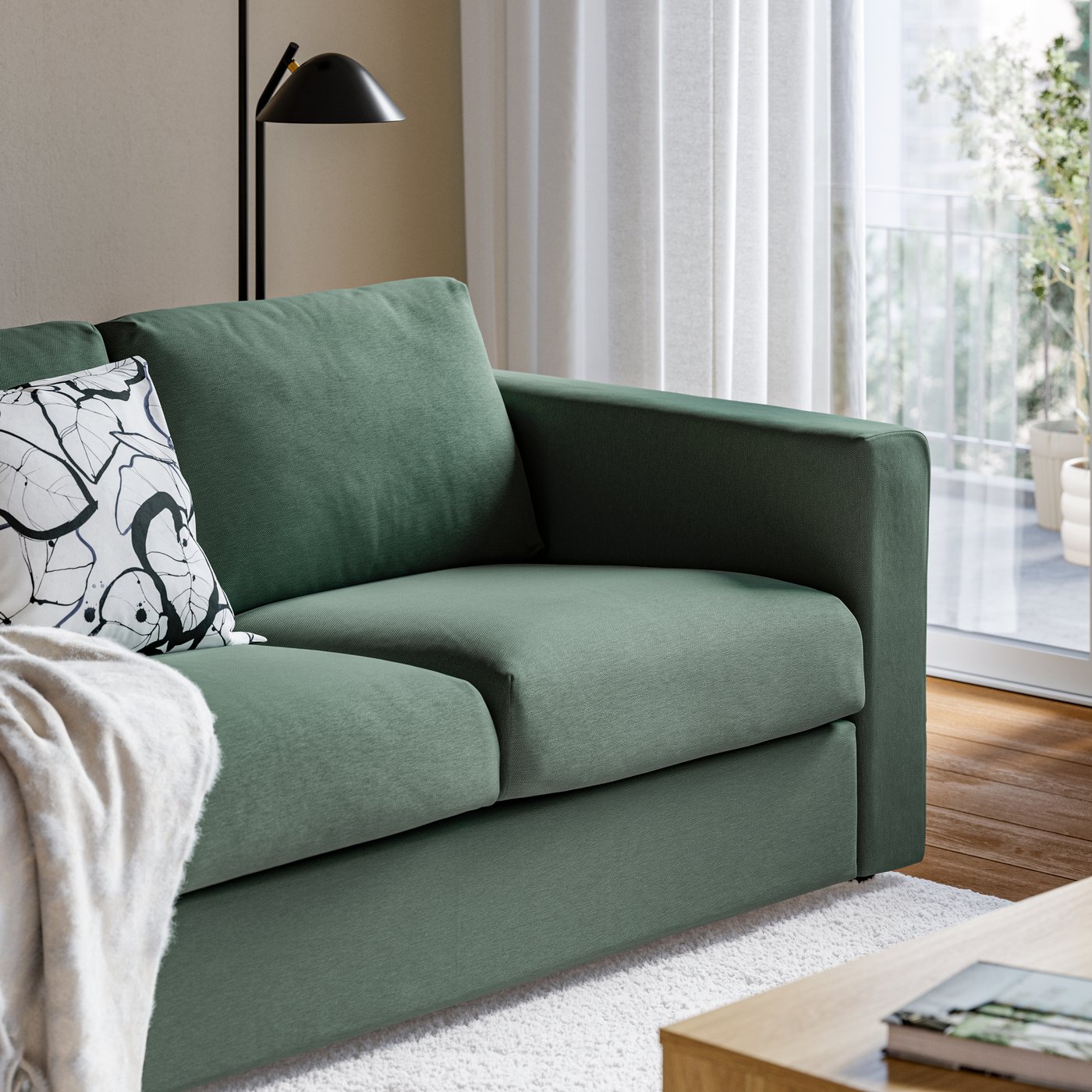 A close-up of a green VIMLE sofa