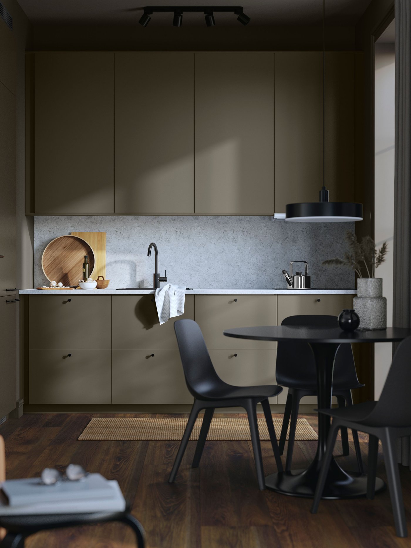 A brown-beige HAVSTORP door in the kitchen