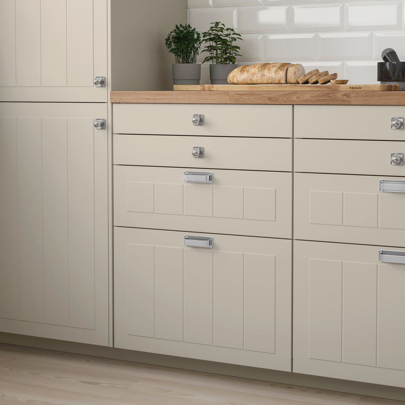A beige STENSUND drawer front