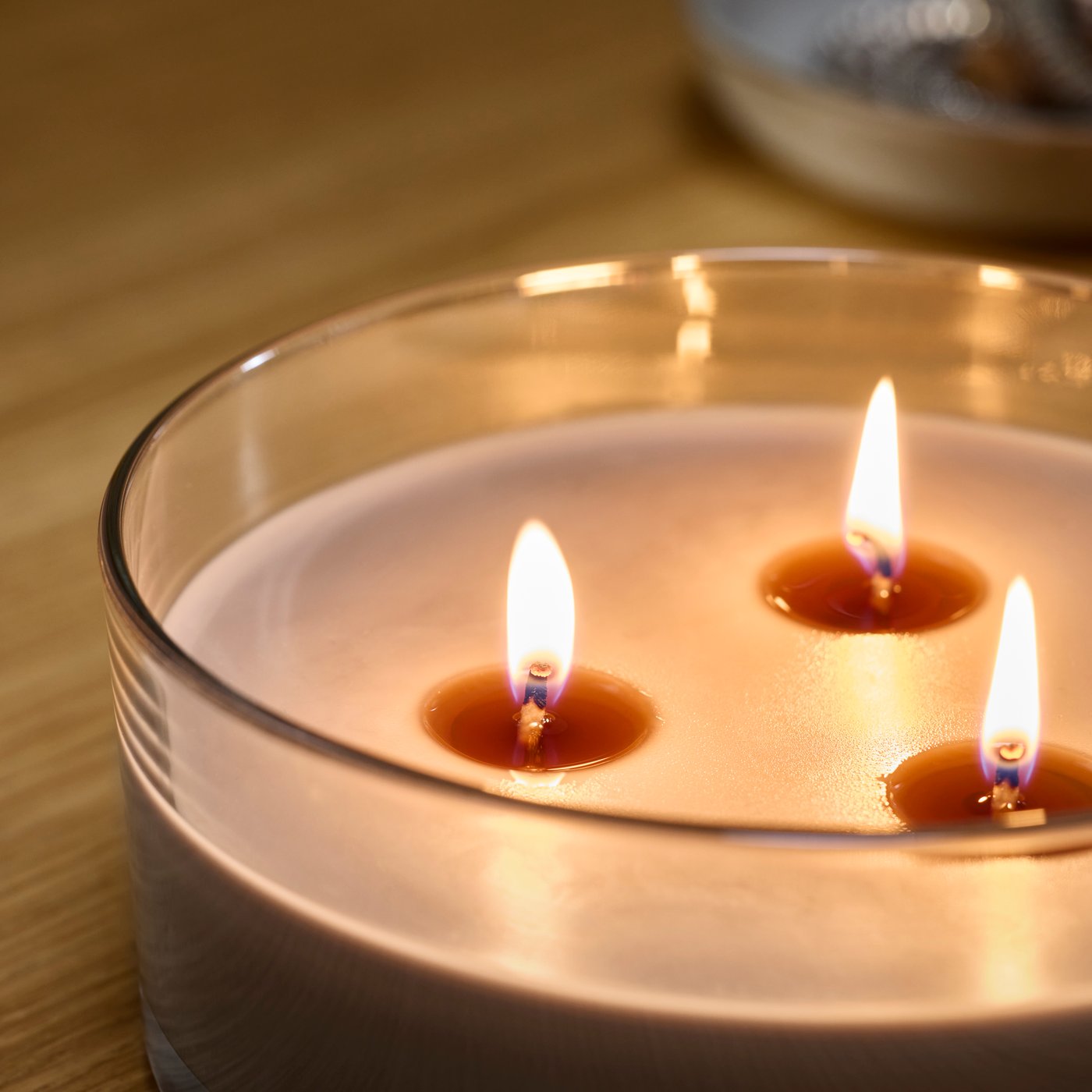 A Sandalwood & patchouli brown LOTSFÅGEL scented candle in glass, 3 wicks