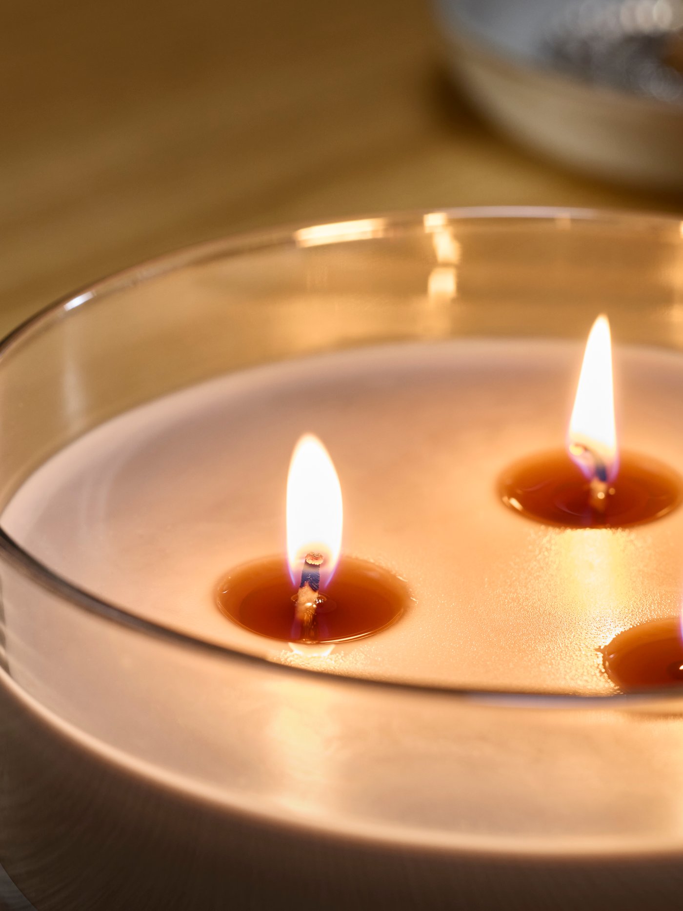 A Sandalwood & patchouli brown LOTSFÅGEL scented candle in glass, 3 wicks