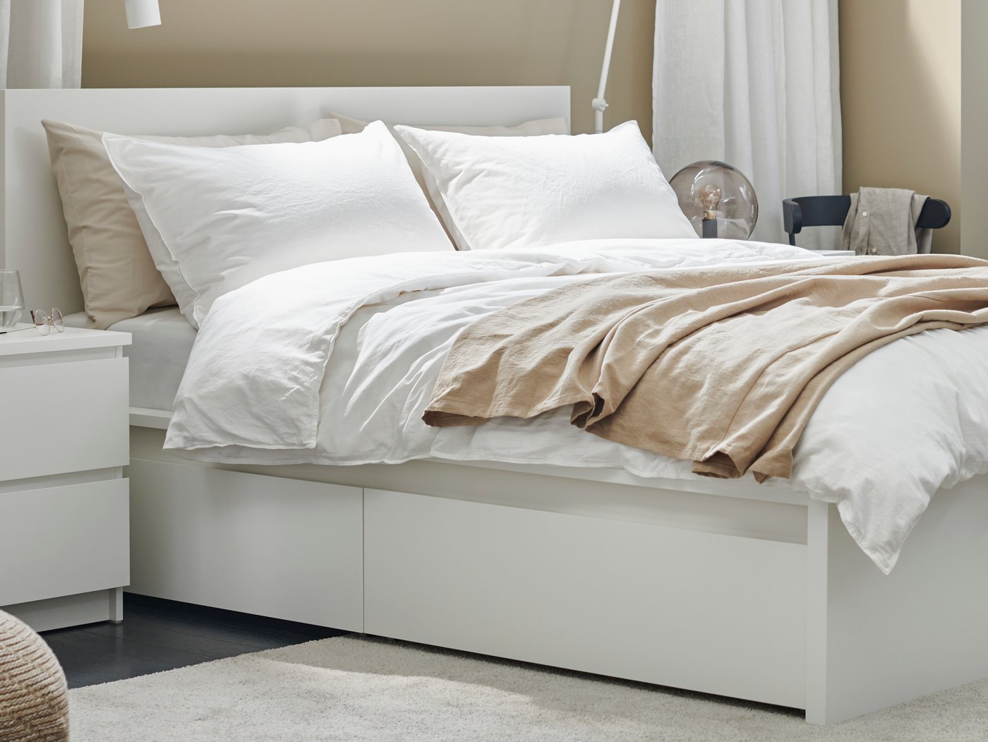A white MALM chest of 2 drawers in the bedroom