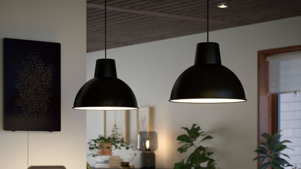 A black SKURUP pendant lamp in the kitchen