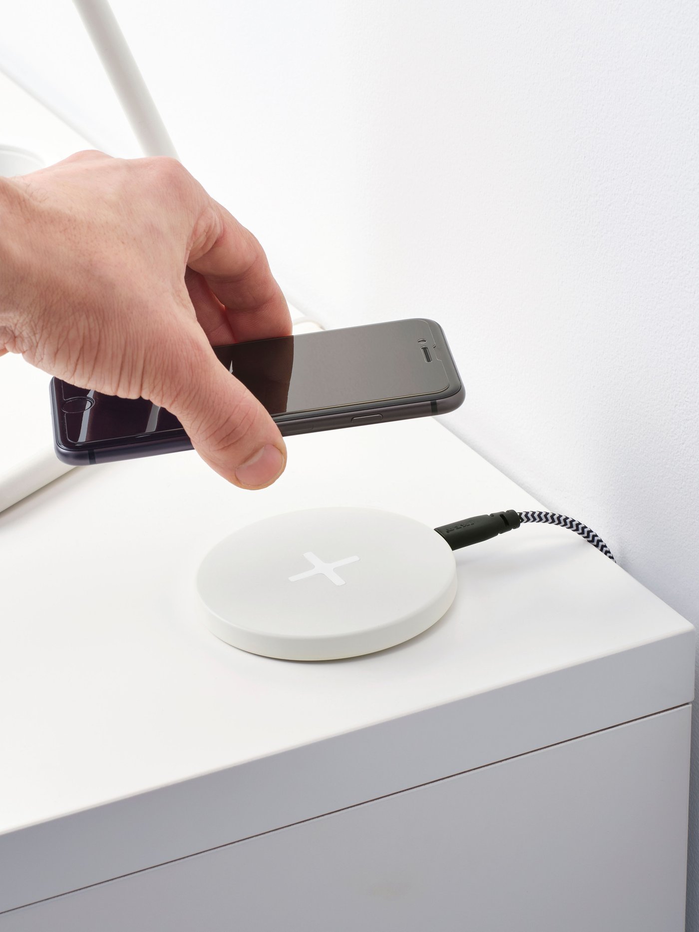A white LIVBOJ wireless charger