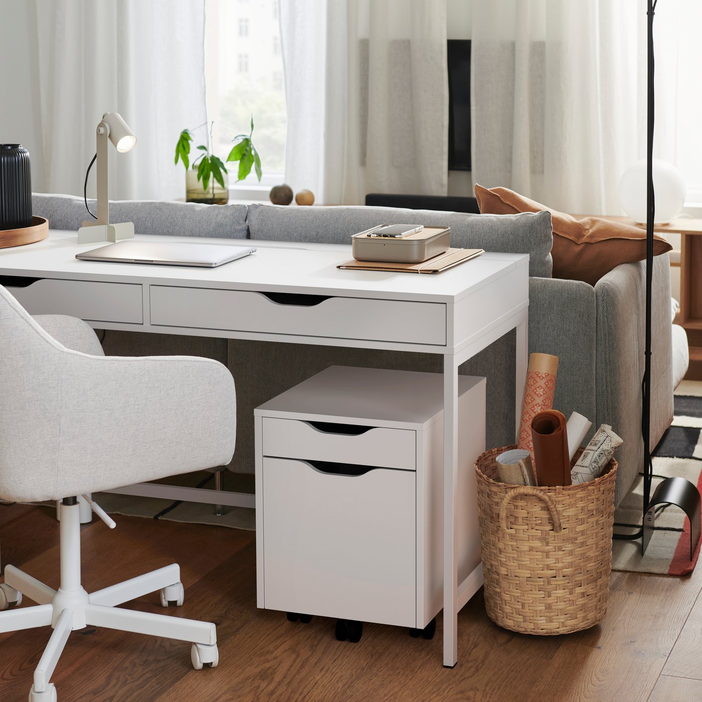 A white/black ALEX drawer unit on castors