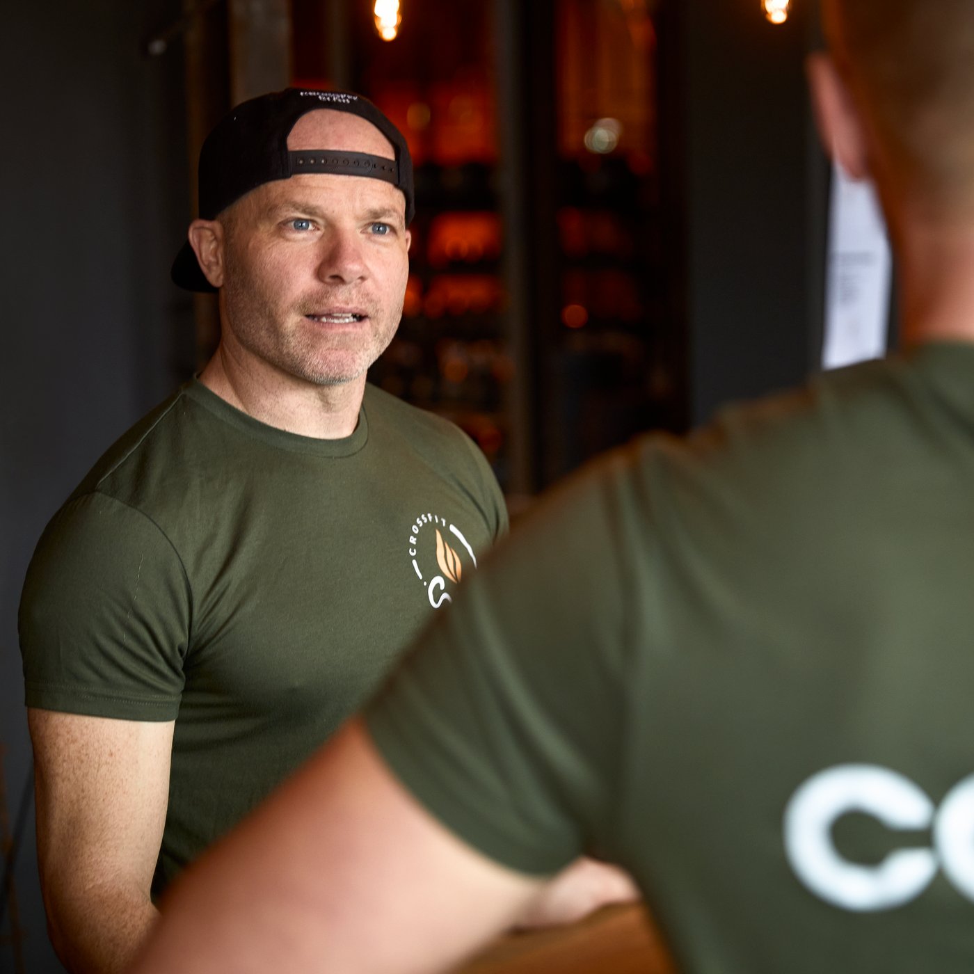 Trenings coacher prater sammen.