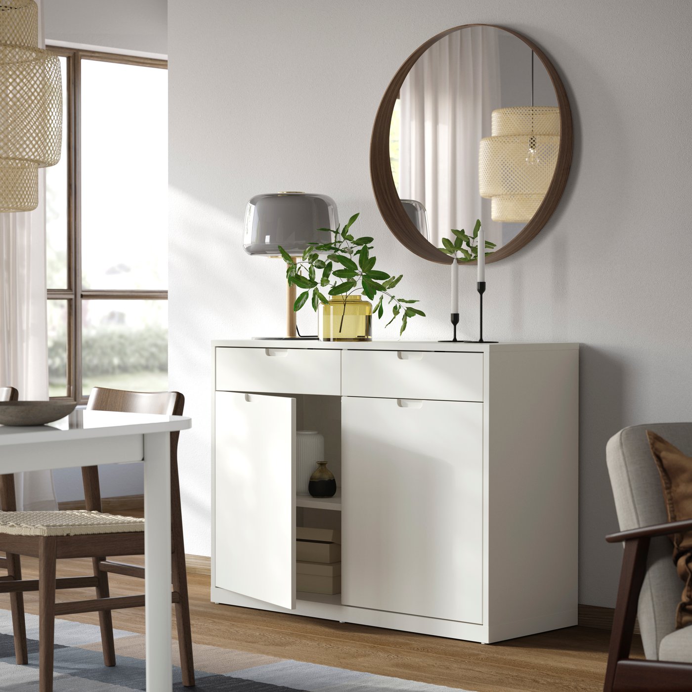 An off-white TONSTAD sideboard in the dining room