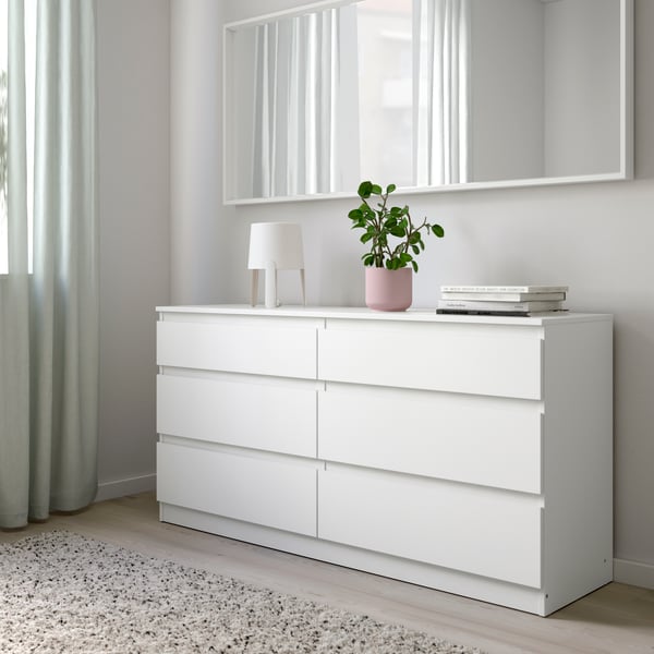 A white KULLEN chest of 6 drawers in a bright bedroom