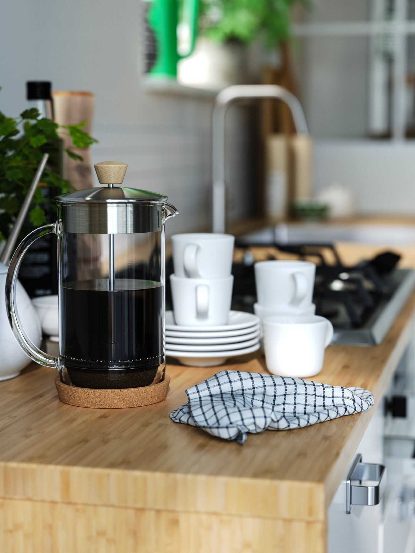 A clear glass/stainless steel IKEA 365+ coffee/tea maker in the kitchen