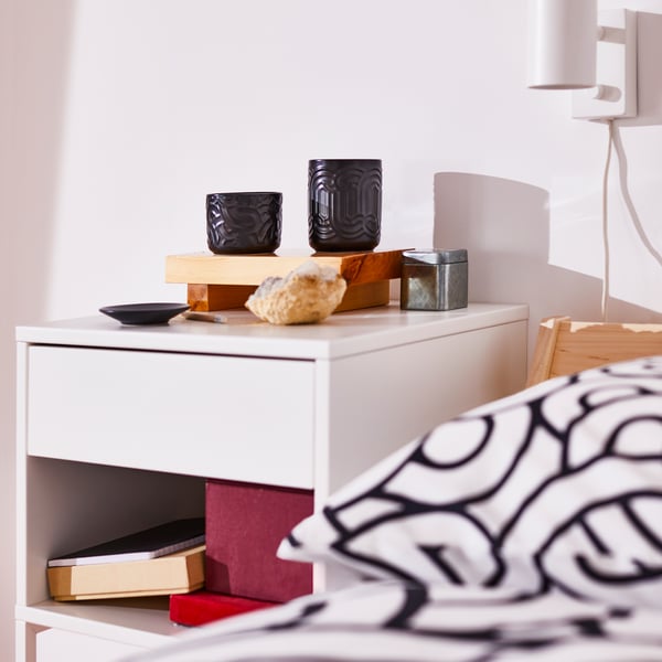 A matcha tea & ginger/black SÖTRÖNN scented candle in ceramic jar