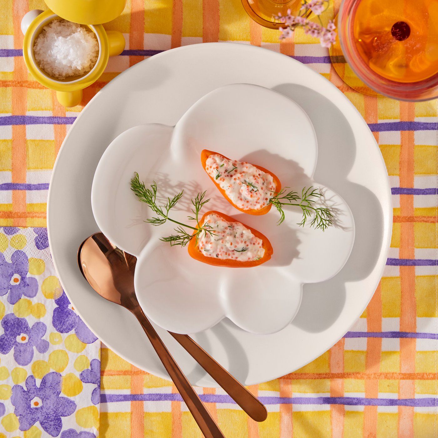 A table arrangement with white TJÄRLEK plates.