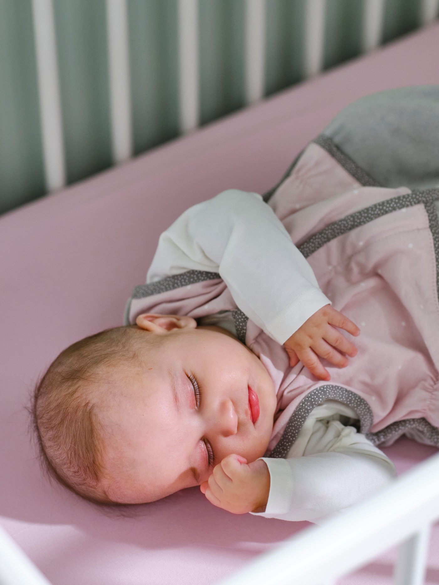 A pink LEN sleep bag