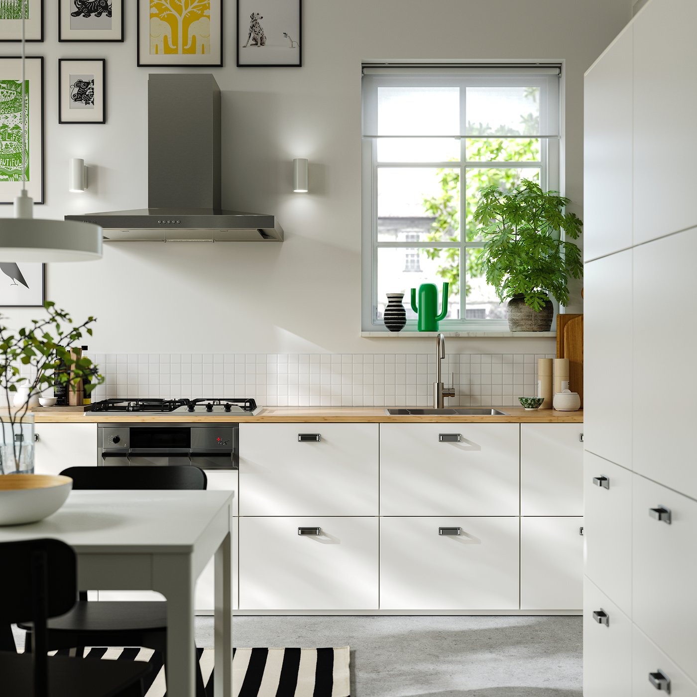 A wireless dimmable white spectrum/white NYMÅNE LED pendant lamp in the kitchen