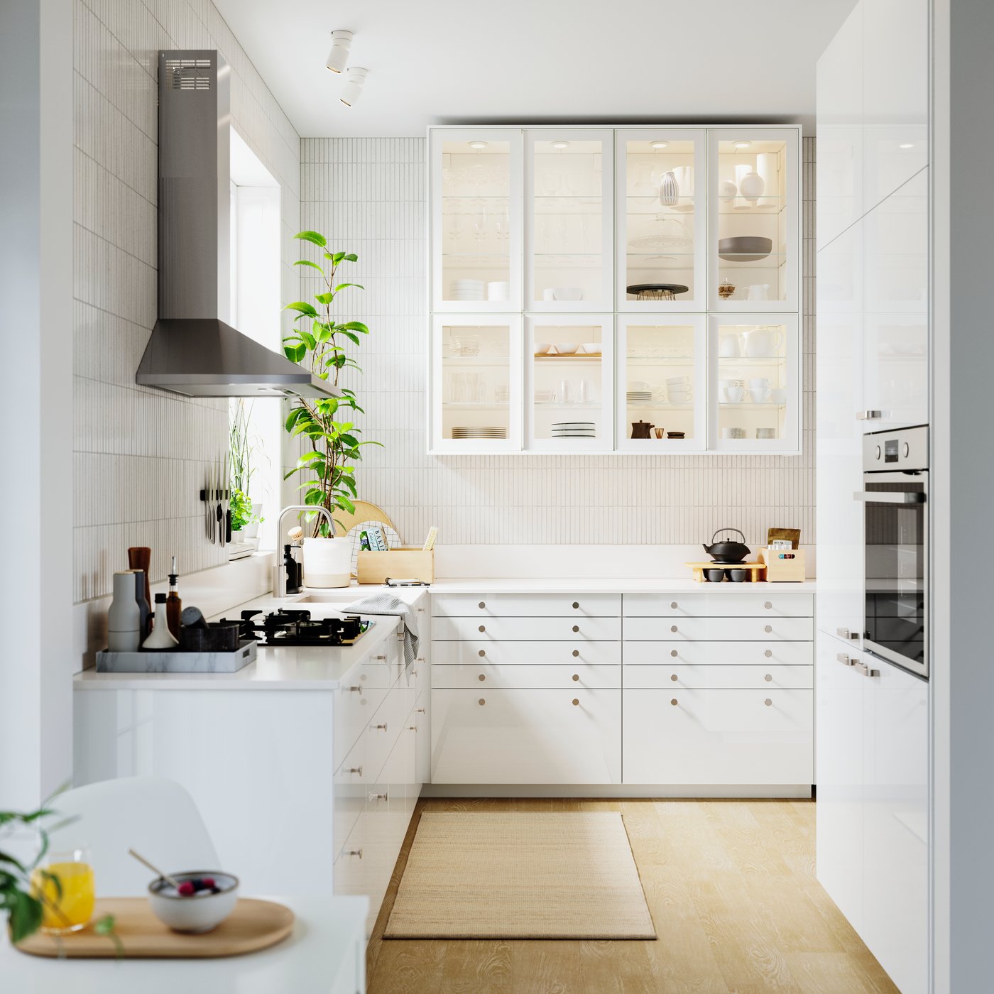 A white/clear glass HEJSTA glass door in the kitchen