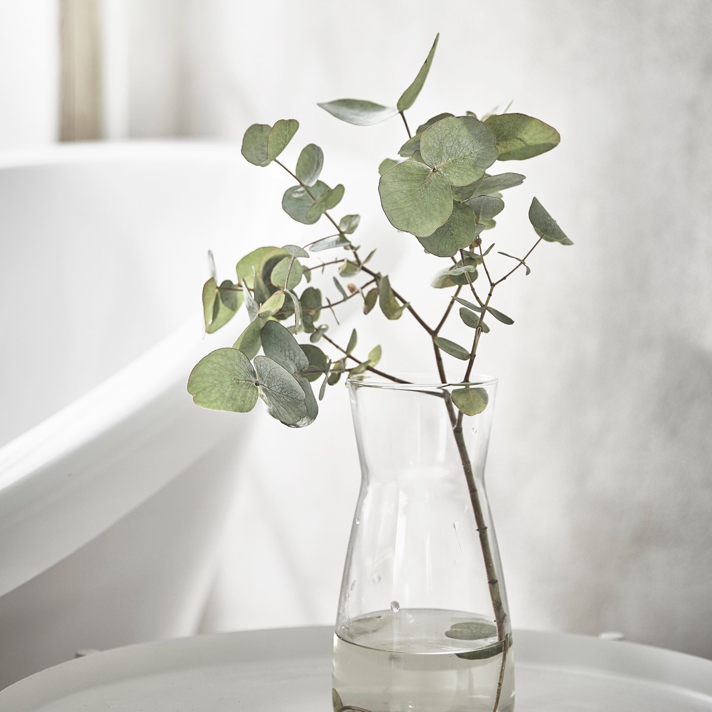 A Crisp mint/dark green AVMÅLA scented candle in ceramic jar