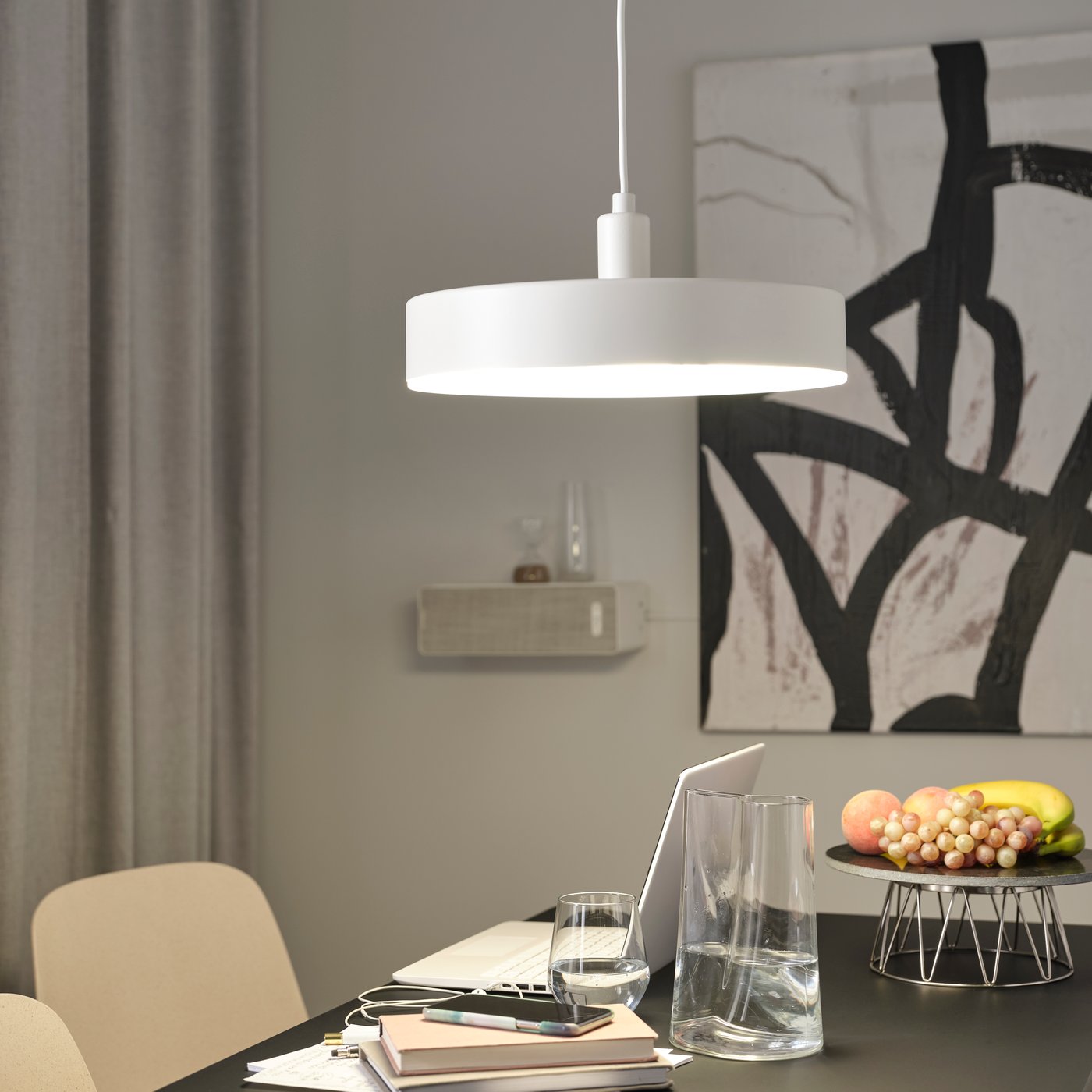 A wireless dimmable white spectrum/white NYMÅNE LED pendant lamp
