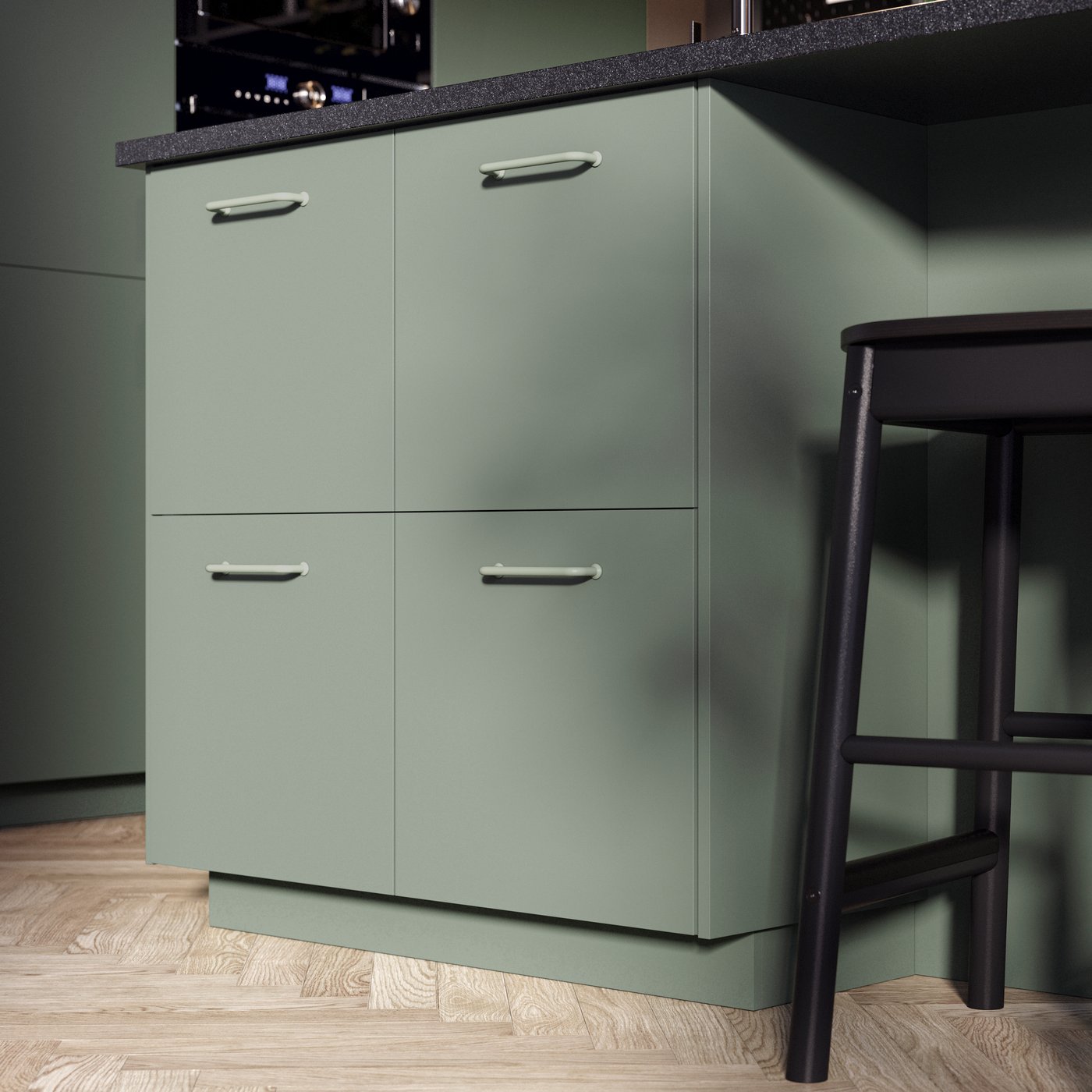 A kitchen with matt grey-green NICKEBO fronts.