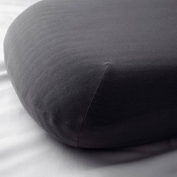A grey TÖCKENFLY pillowcase for ergonomic pillow