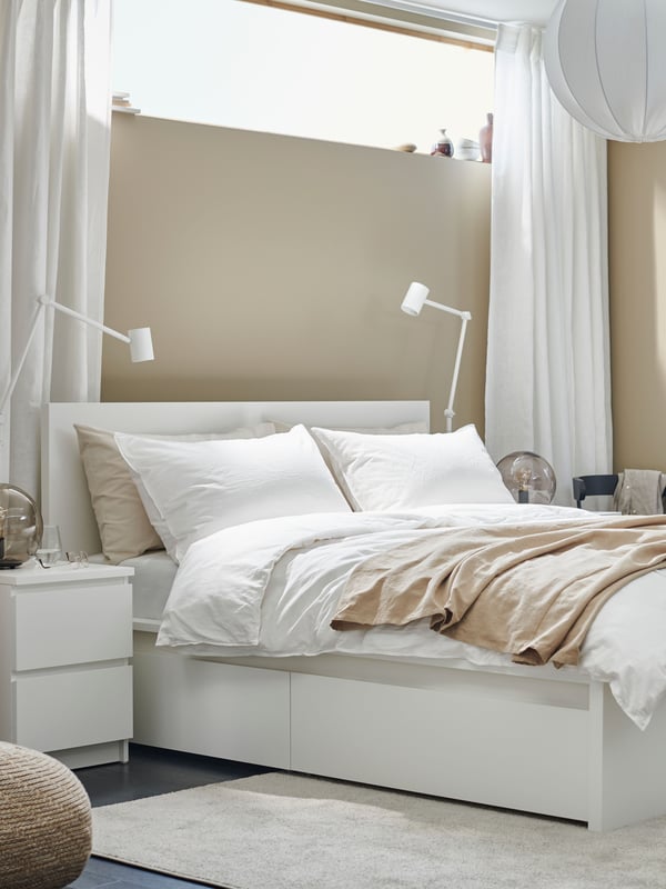 A white MALM chest of 2 drawers in the bedroom