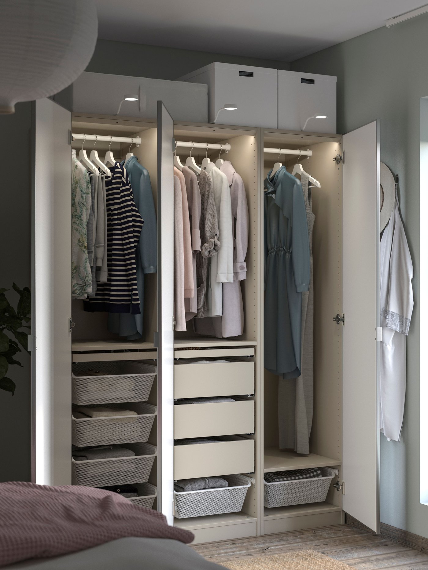 A white PAX wardrobe combination in a bedroom. 