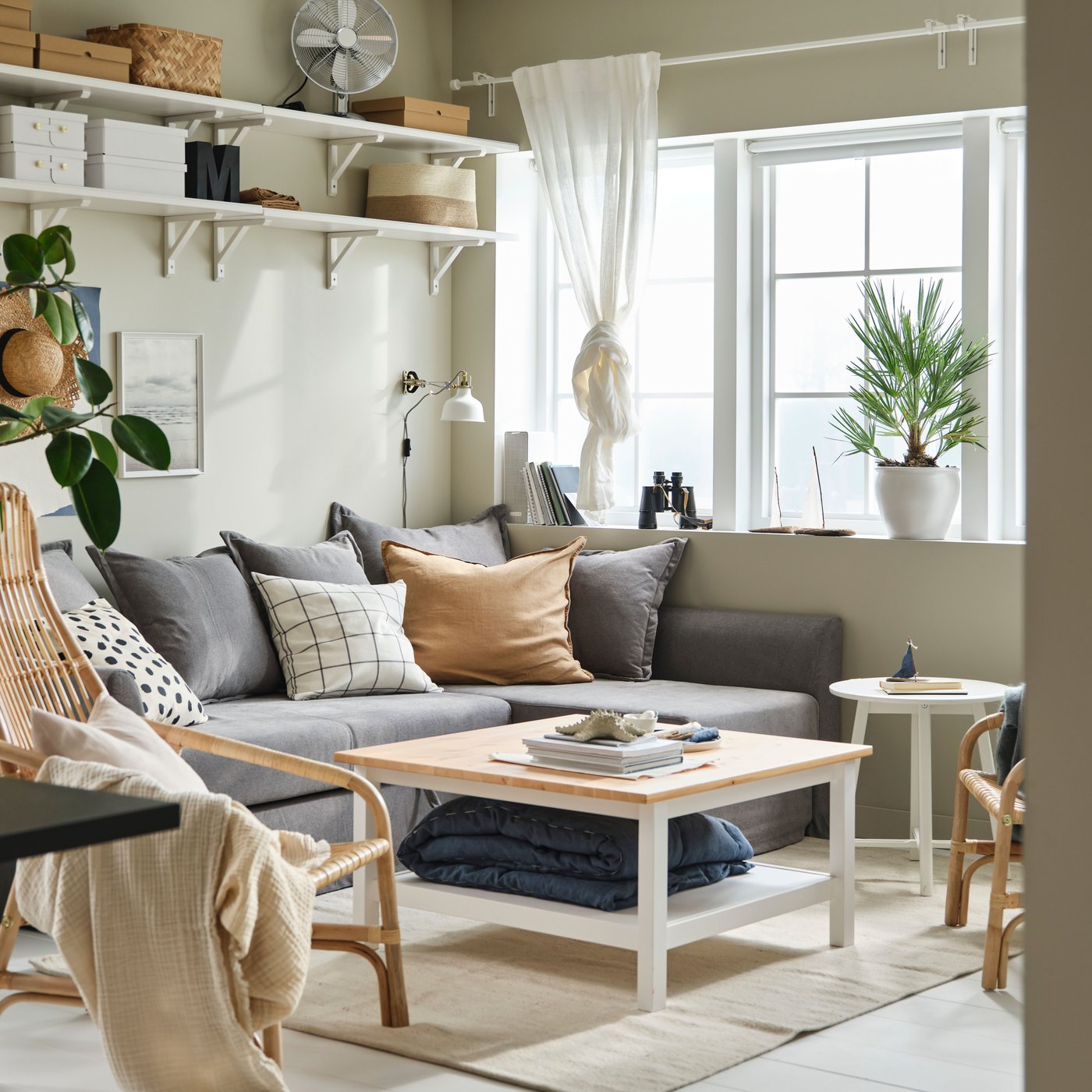 A white stained aspen TRANHULT shelf in the living room