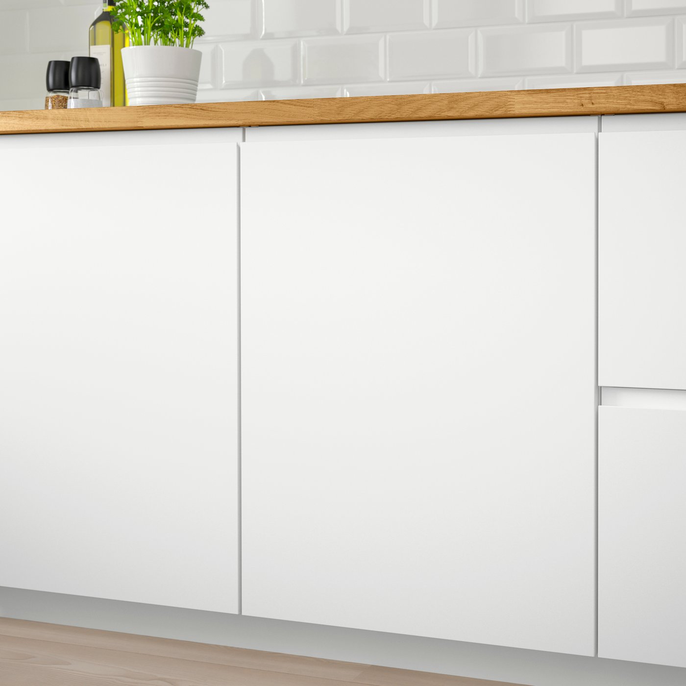 A matt white VOXTORP door