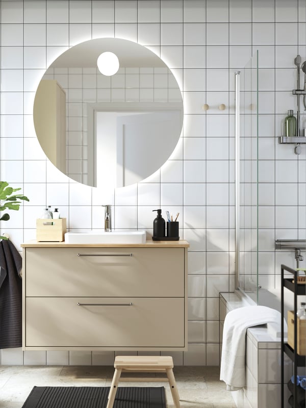 A dark grey VÅGSJÖN hand towel