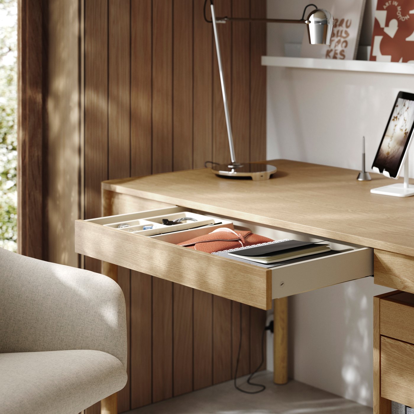 An oak veneer TONSTAD desk in the home office