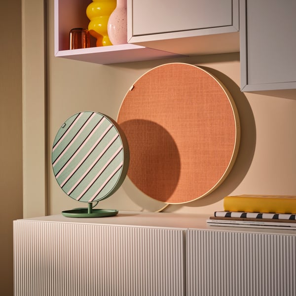 A green SOLSKYDD Bluetooth speaker