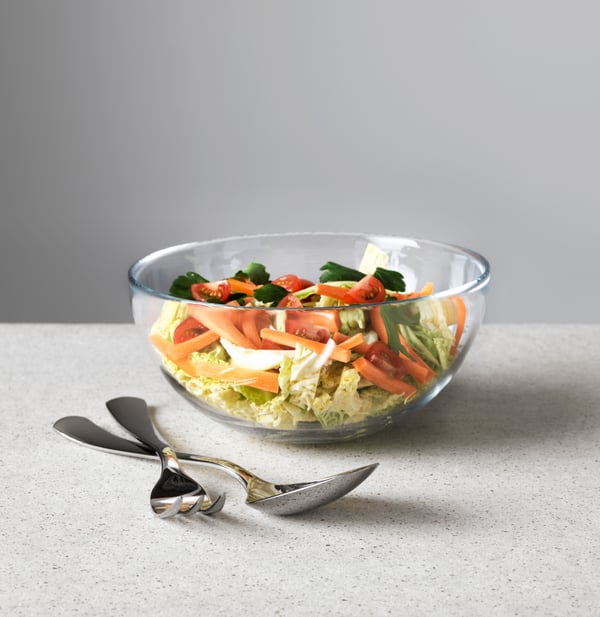 A clear glass BLANDA serving bowl